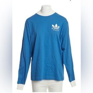 Gucci & Adidas. White stripe down one sleeve, Iconic Gucci stripe down the other